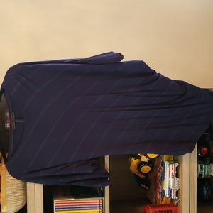 Asymmetrical shirt. Worn once. Color is dark navy blue with green strips